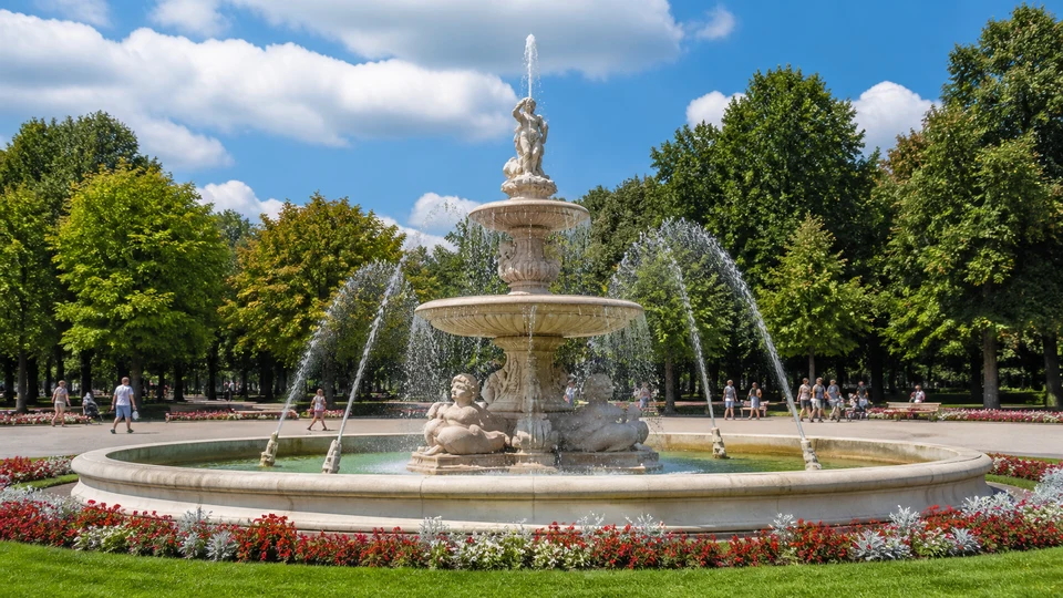Fountain: a structure from which water is sent up into the air by a pump, used to decorate parks and gardens / yards
